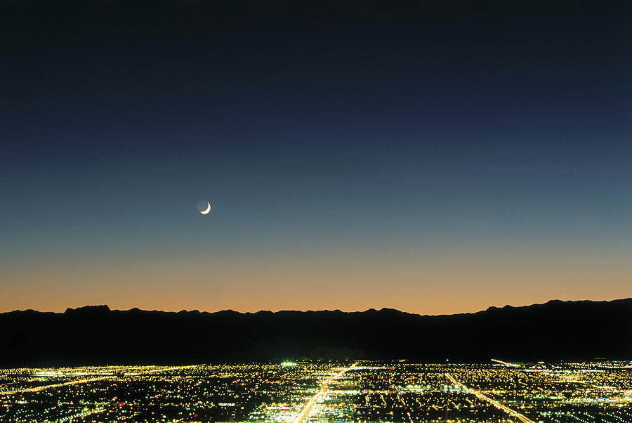 Las Vegas Photograph - Crescent Moon Over Las Vegas by Buena Vista Images