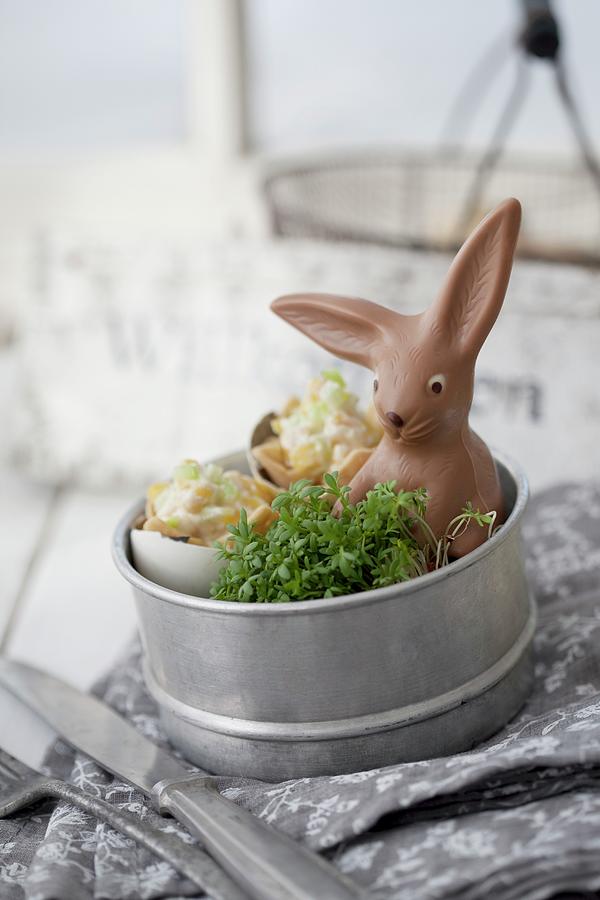 Cress, Small Snacks And Chocolate Easter Bunny In Tin Photograph by Martina Schindler