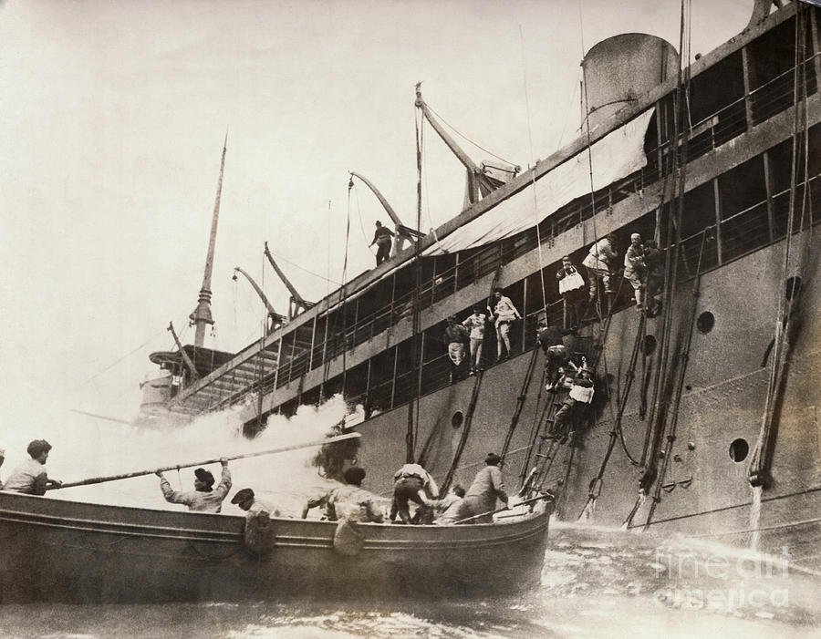 Crew Abandoning Ship Photograph by Bettmann