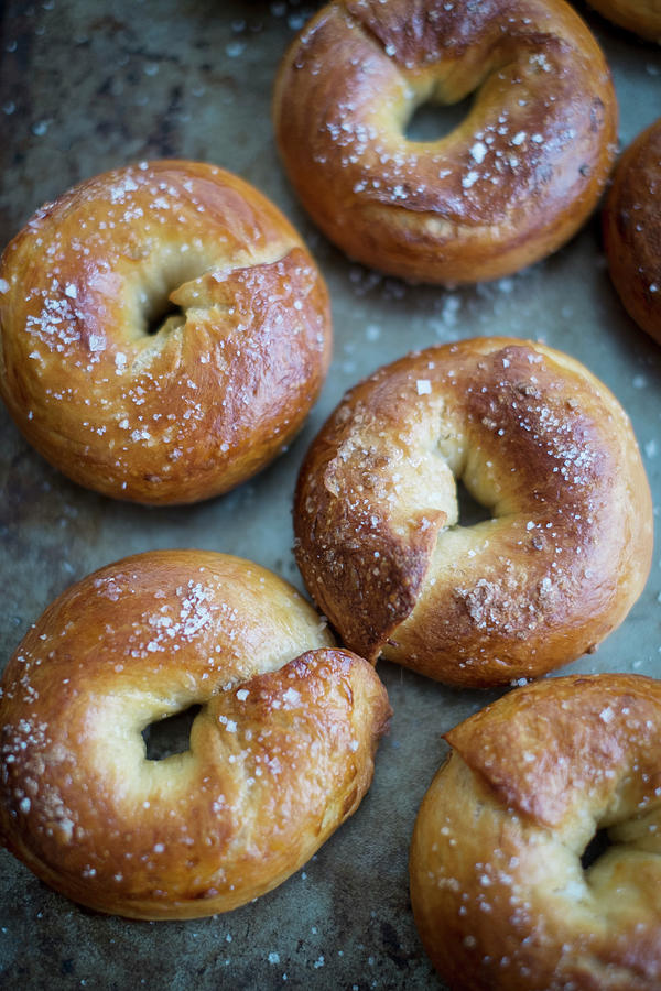 Crisp Bagels With Sea Salt On A Baking Tray Photograph by Eising Studio