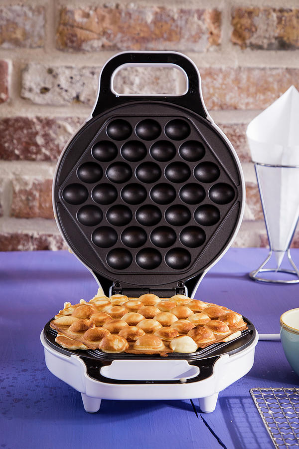 Crispy Baked Bubble Waffles In A Waffle Iron Photograph by Esther Hildebrandt