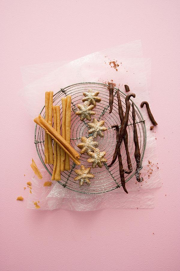 Crispy Cinnamon Wafer Sticks, Aniseed Stars And Baked Vanilla Pods Photograph by Michael Wissing
