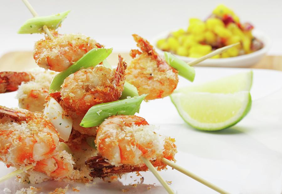 Crispy Fried Crayfish Skewers With Lime And Grated Coconut Photograph by Creative Photo Services