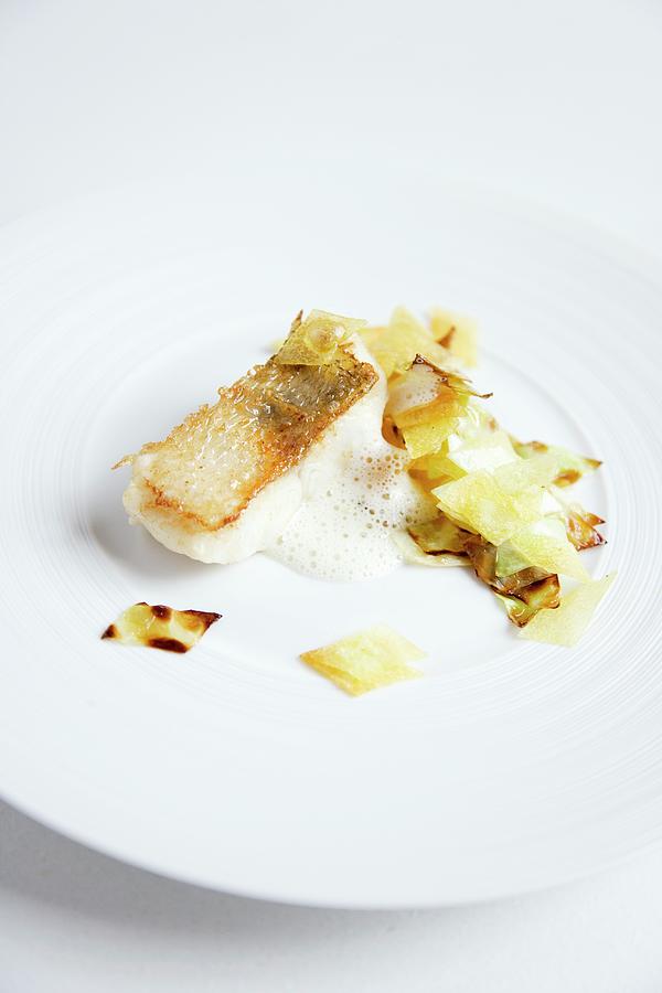 Crispy Roast Zander With A Potato And Cabbage Medley And A White Wine Foam Photograph by Michael Wissing