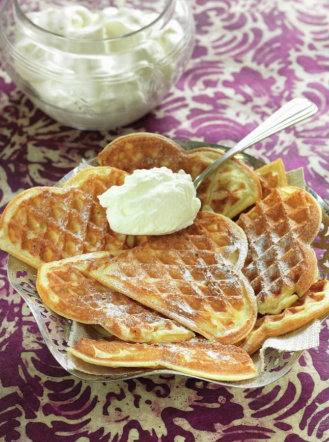 Crispy Waffles With Icing Sugar And Whipped Cream Photograph by Nicolas Leser