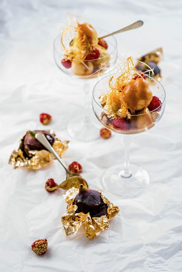 Crochembouche In Desert Classes With Raspberries And Figs Wrapped In Gold Leaf Photograph by Great Stock!