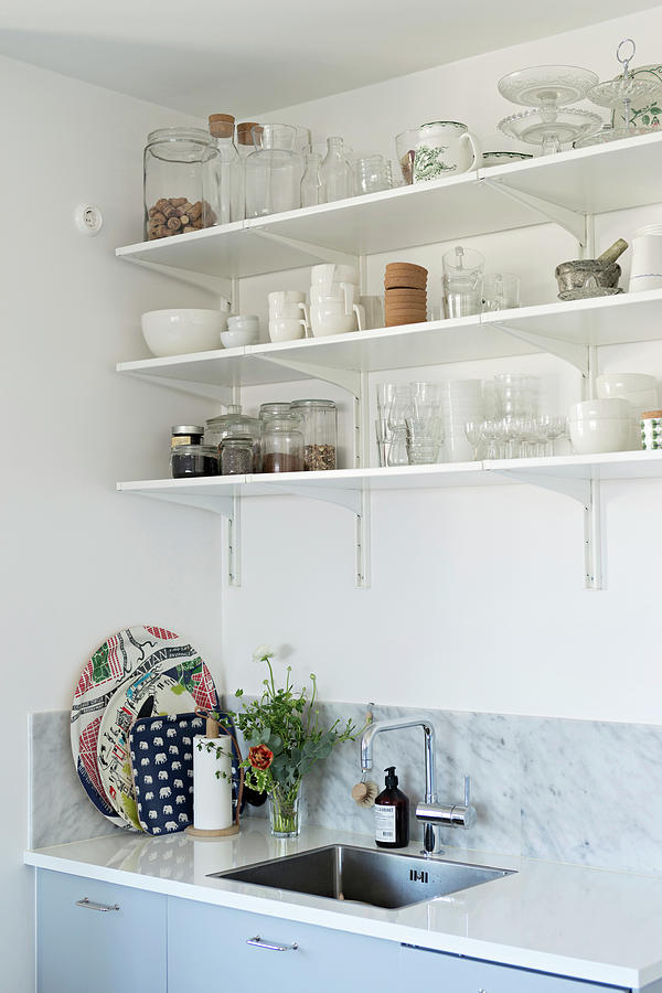 Crockery And Groceries On Open Kitchen Shelves Above Sink Photograph by Cecilia Mller