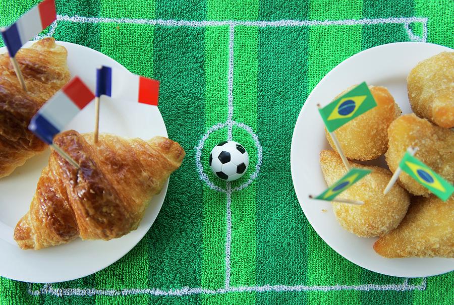 Soccer Photograph - Croissants france And Salgadinhos brazil With Football-themed Decoration by Schindler, Martina