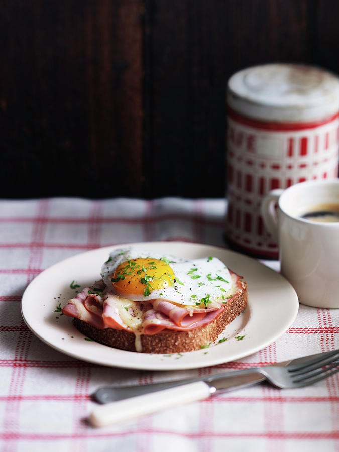 Croque Madame Toast With Ham And Fried Egg, And A Cup Of Coffee Photograph by Karen Thomas