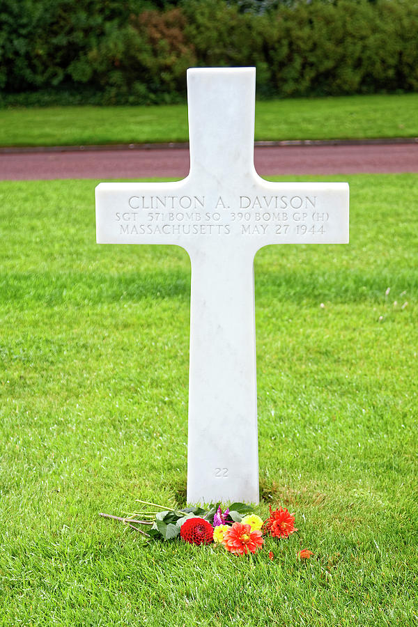 Cross and Flowers on Grave Photograph by Sally Weigand