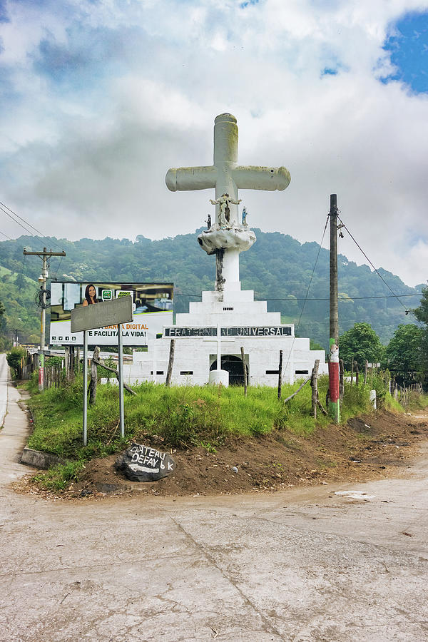 Cross by the road in countryside in Guatemala. Photograph by Marek Poplawski