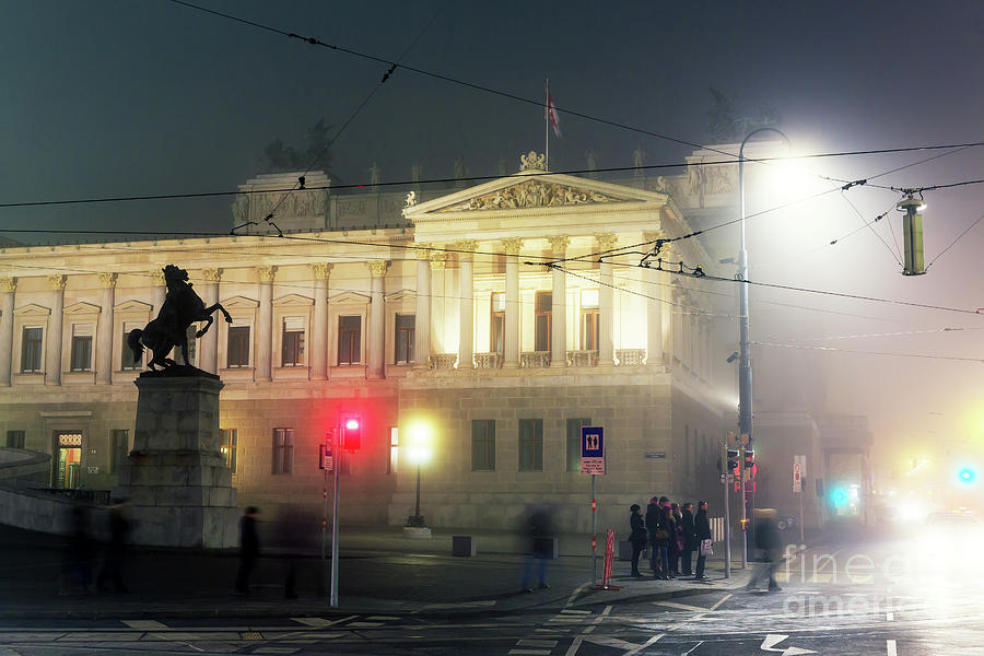 Crossing Universitatsring at Night in Vienna Photograph by John Rizzuto