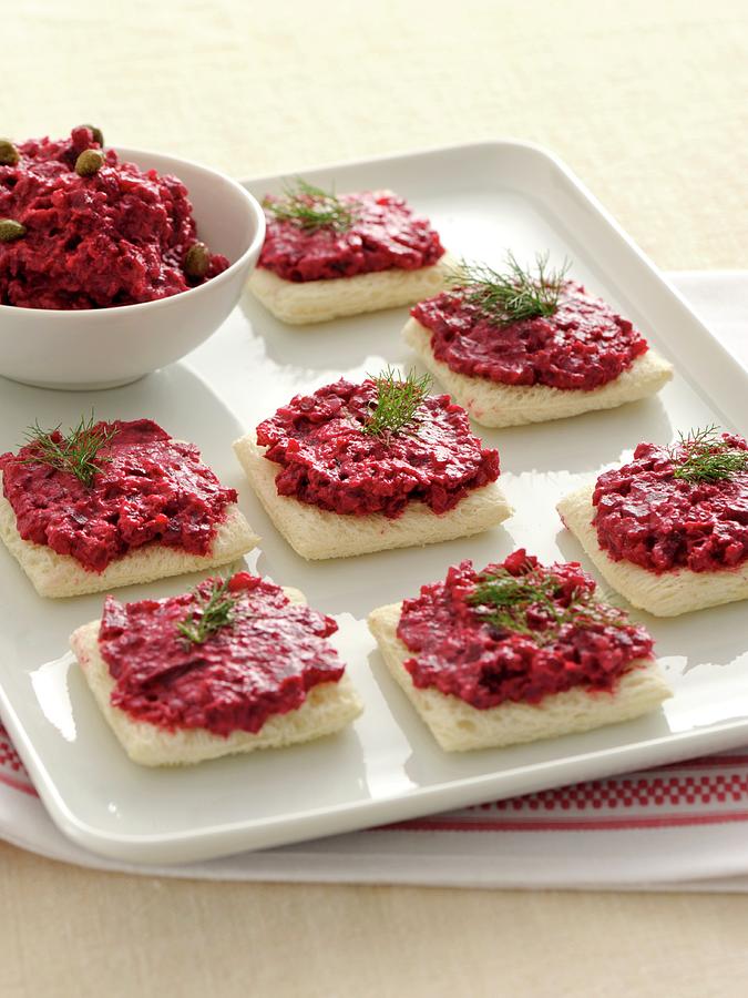 Crostini Topped With A Beetroot Spread Photograph by Franco Pizzochero