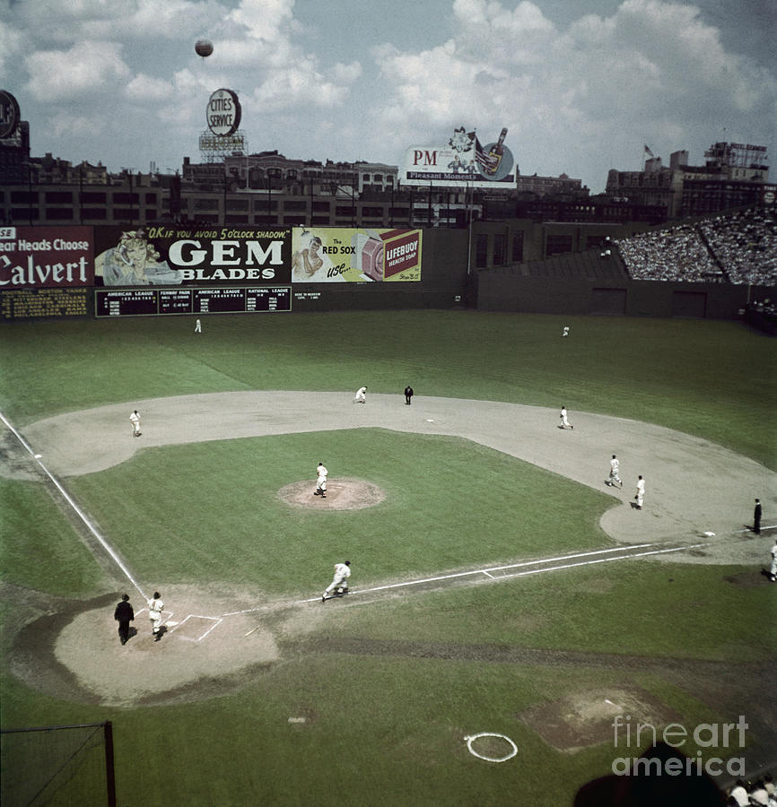 Crowd And Game Action At Fenway Park Photograph by Bettmann