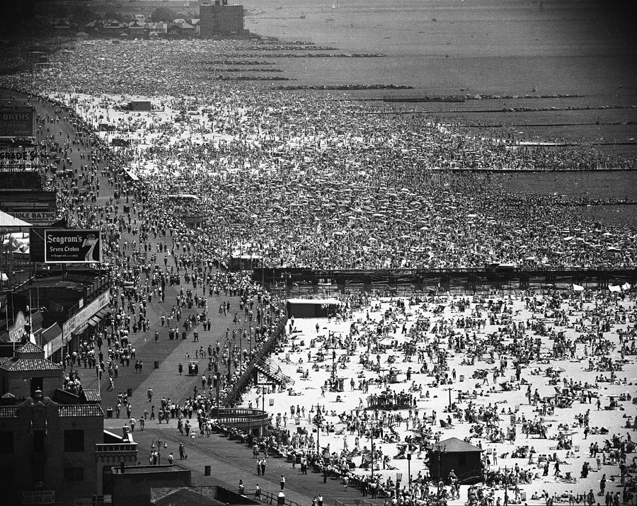 Crowded Beach At Coney Island, New York by Andreas Feininger