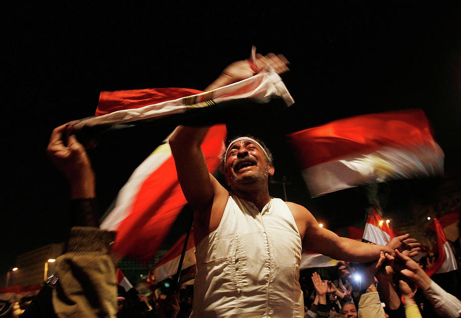 Crowds Rally In Tahrir Square As Photograph by Chris Hondros