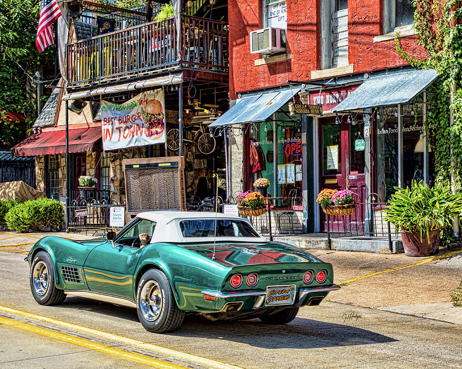 Cruising Main Street Eureka Springs Photograph by Brent Kelly