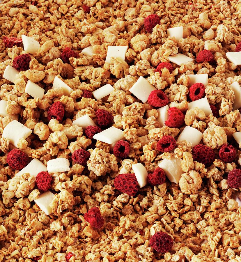 Crunchy Muesli With Raspberries And Pieces Of White Chocolate Photograph by Frank Adam
