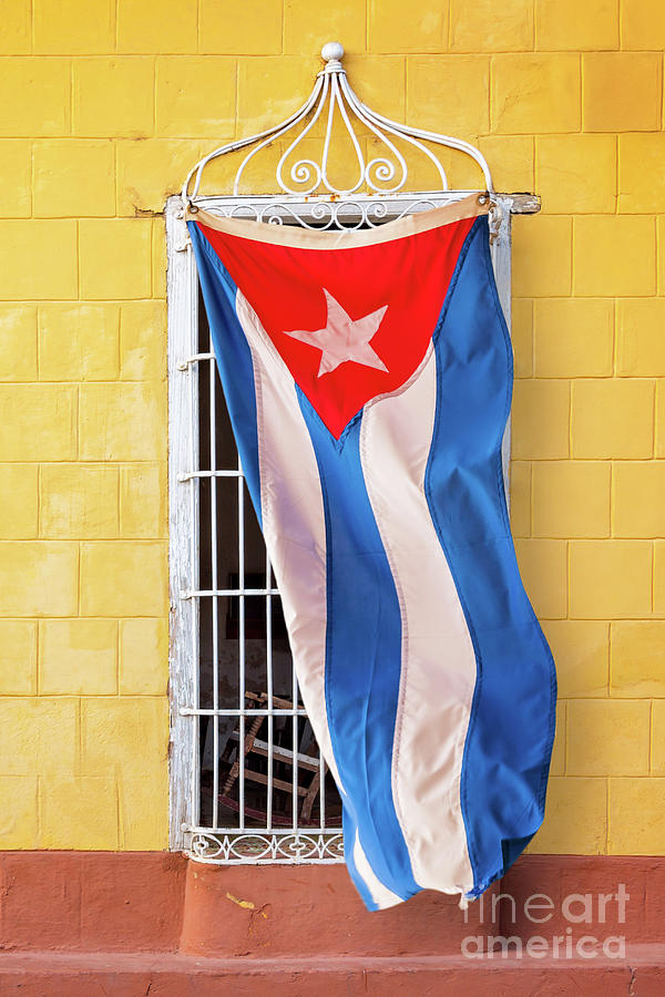 Cuban flag at a window Photograph by Delphimages Photo Creations