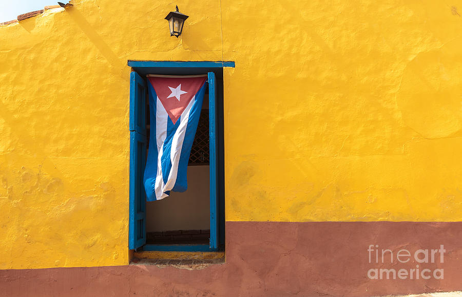 Communist Photograph - Cuban Flag Hanging On A Door by Sabino Parente