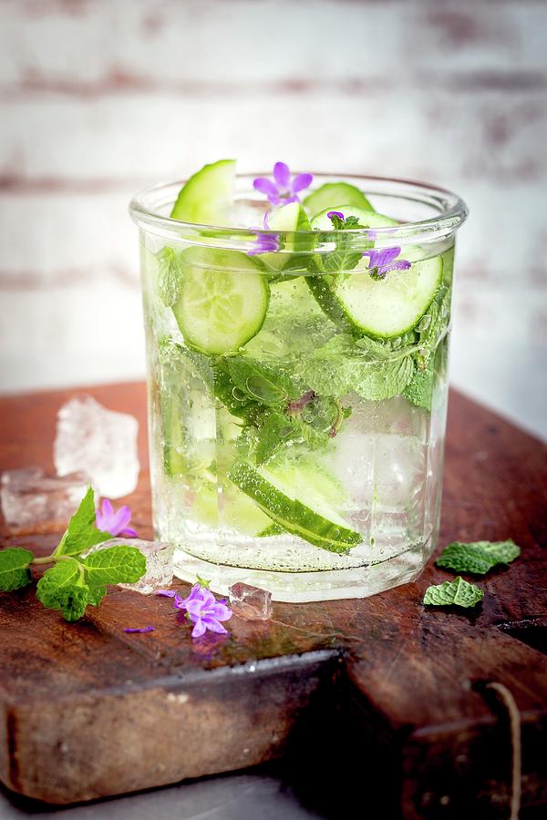 Cucumber And Mint Smoothie With Flowers Photograph by Eising Studio