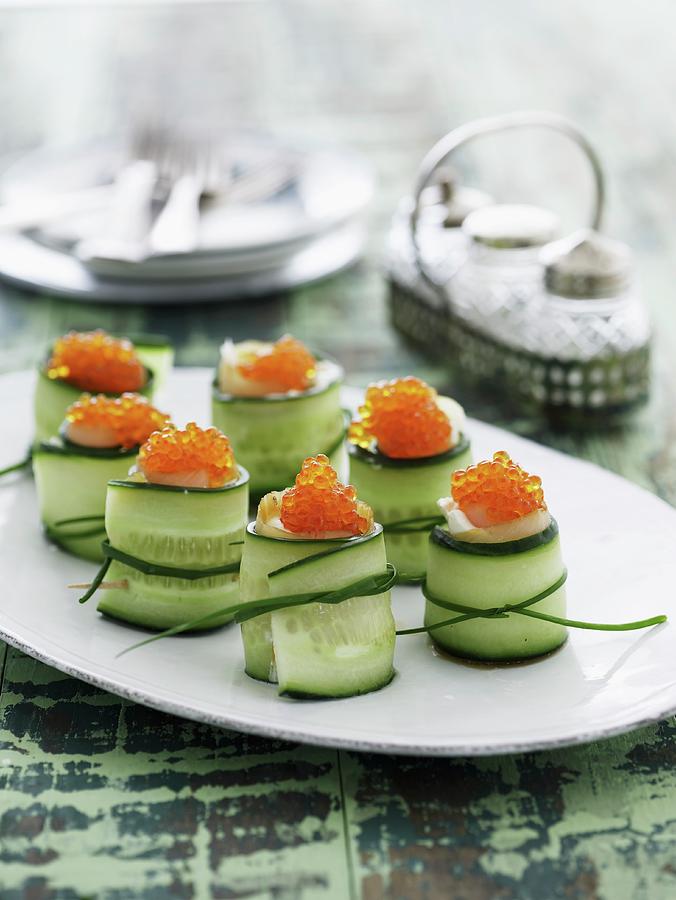 Cucumber Rolls With Caviar Photograph by Mikkel Adsbl