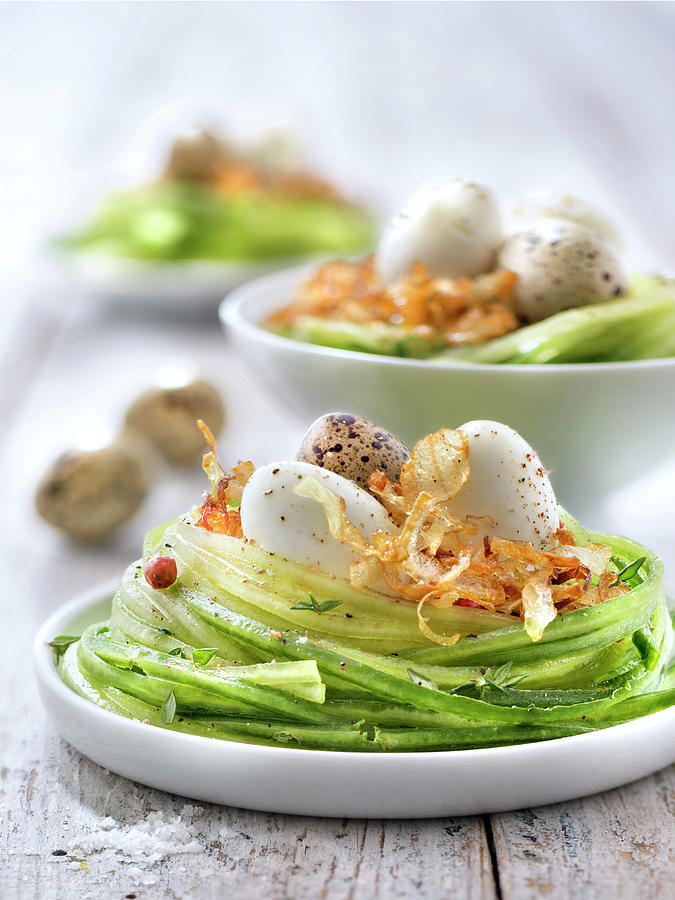 Cucumber Spaghettis Nest,quails Eggs And Fried Onions Photograph by Studio