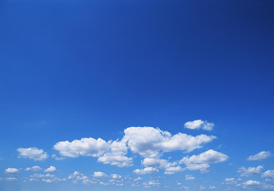 Cumulus Clouds In Bright Blue Sky by Mecky