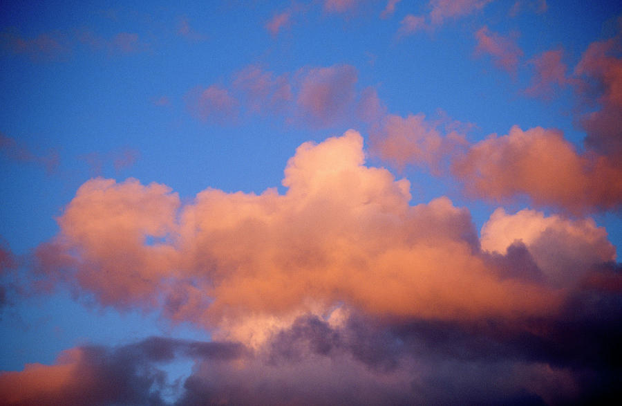 Cumulus Clouds In Sky At Sunset Photograph by Andrew Holt