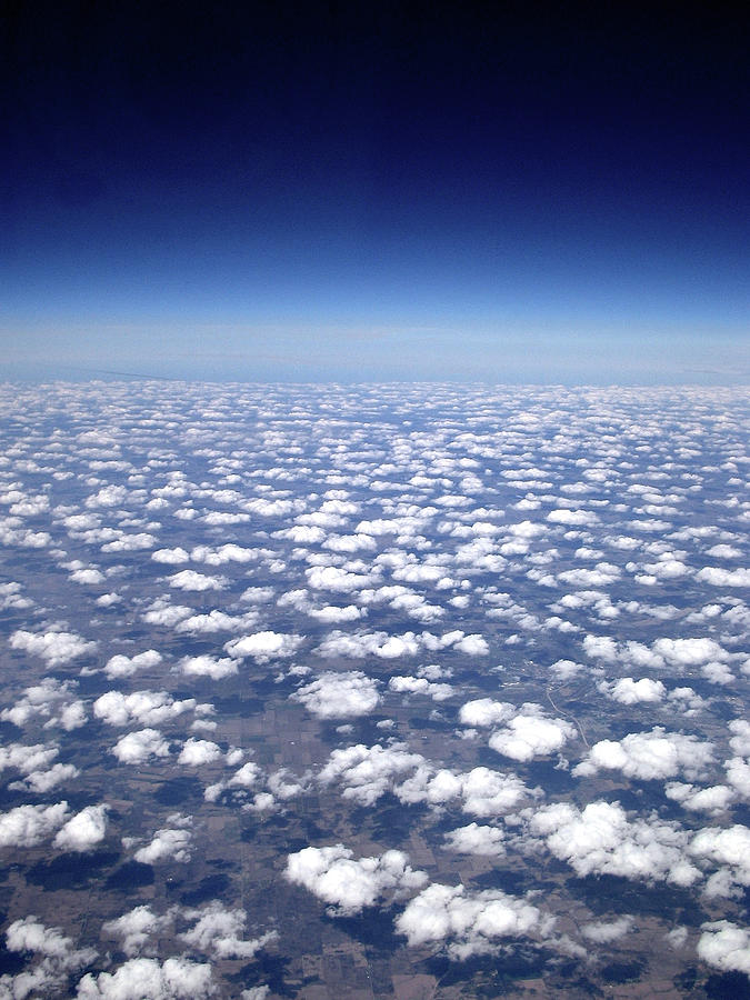 Cumulus Clouds Over The Midwest In The Photograph by Roger Kisby
