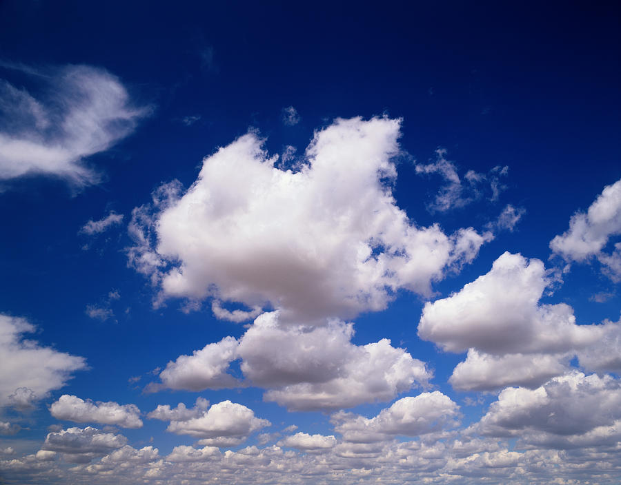 Cumulus Clouds Photograph by Robert Glusic
