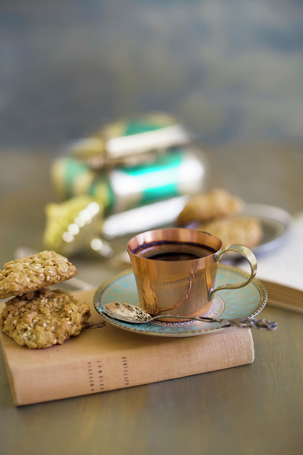 Cup Of Mocha Coffee And Biscuit On Book Photograph by Alicja Koll