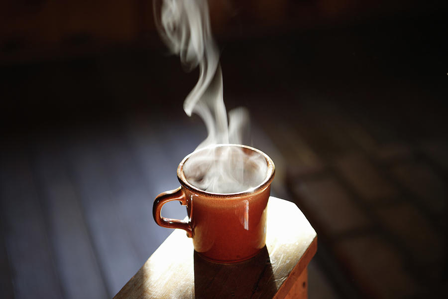 Cup Of Steaming Coffee Photograph by Paul Taylor