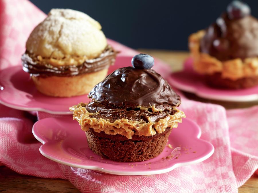 Cupcakes Topped With Praline And Filled With Peanut Butter Photograph by Studio R. Schmitz