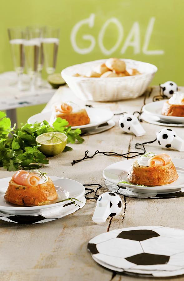Cupcakes Topped With Smoked Salmon And Cream Cheese For A Football-themed Party Photograph by Birgit Twellmann