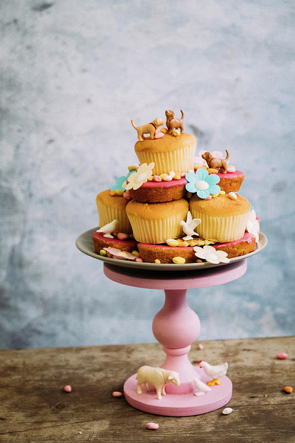 Cupcakes With Eatable Flowers And Animal Decorations Photograph by Lucie Beck