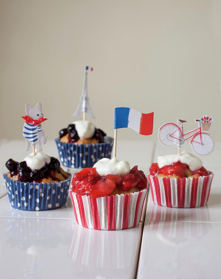 Cupcakes With Strawberries And Blueberry Compote For The French National Holiday Photograph by Katharine Pollak