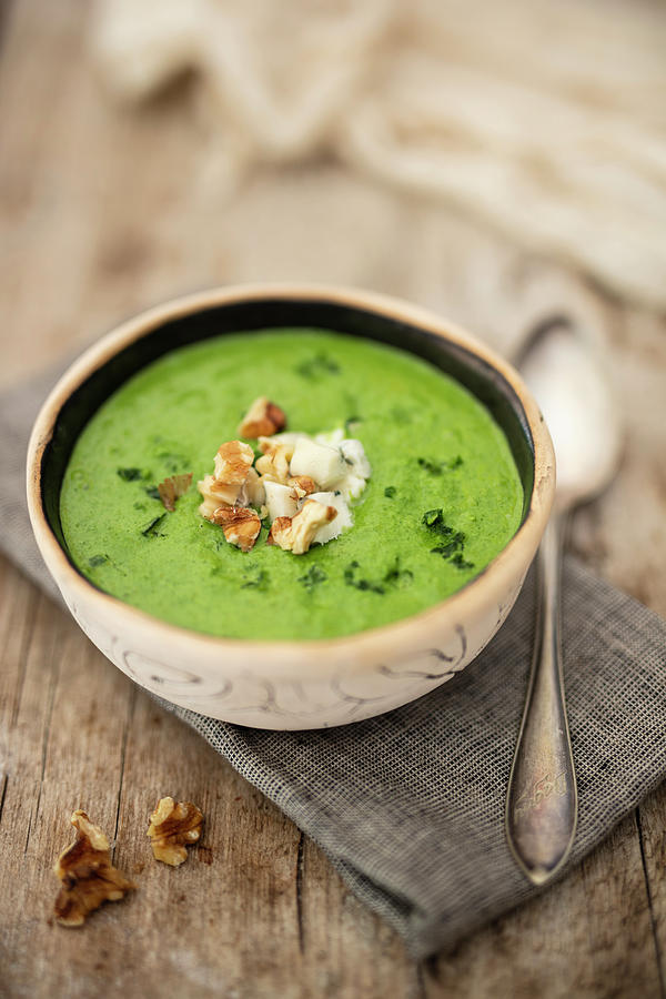 Curly Kale Soup With Blue Cheese And Walnuts Photograph by Jan Wischnewski