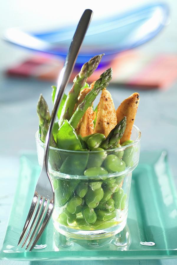 Curried Chicken With Broad Beans,sugar Peas And Asparagus Photograph by Czap