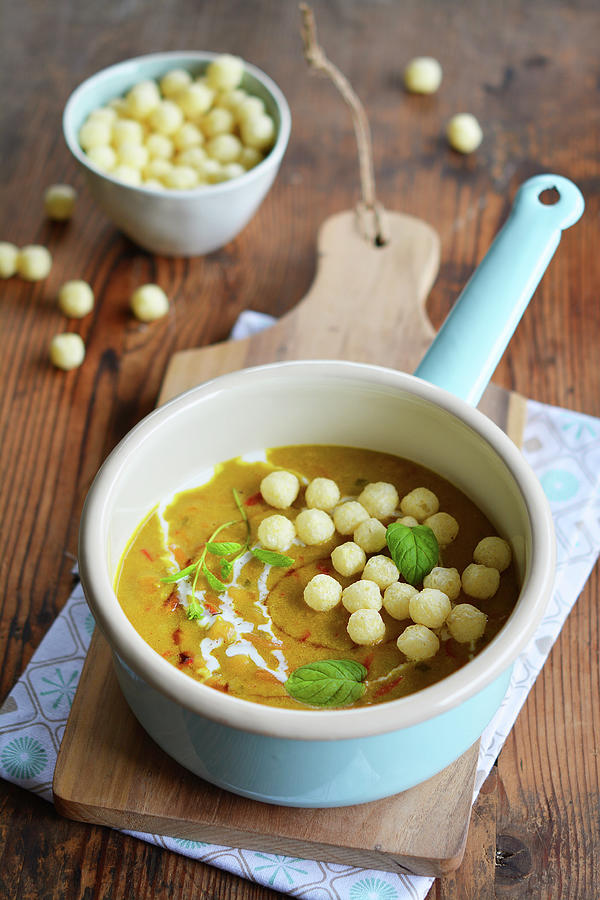 Curry Soup With Millet Balls In An Enamel Pan Photograph by Mariola Streim