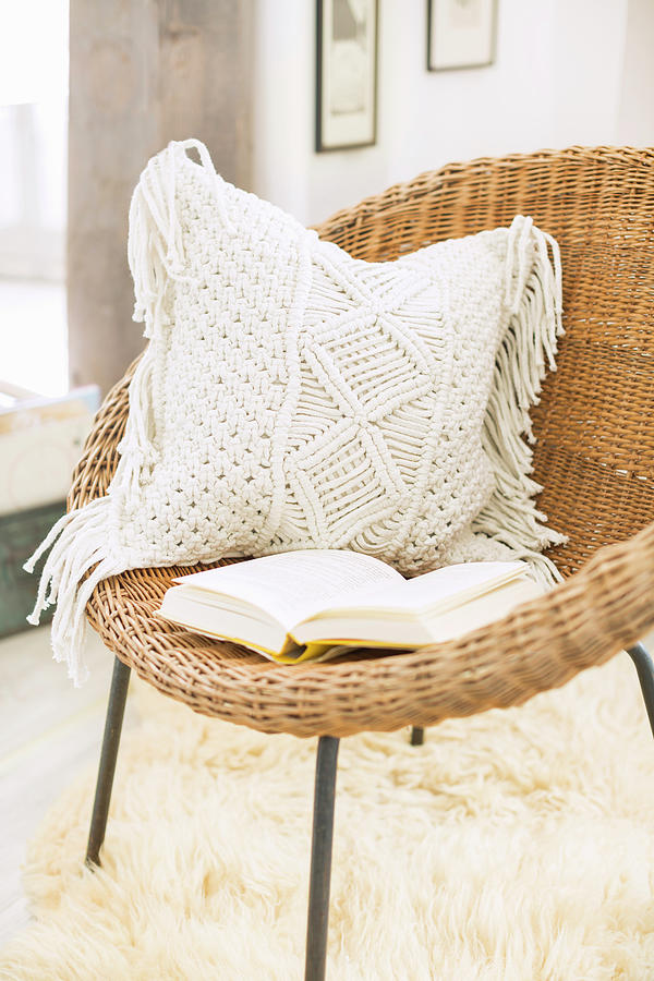 Book Photograph - Cushion With Macrame Cover On Wicker Chair by Sabine Lscher