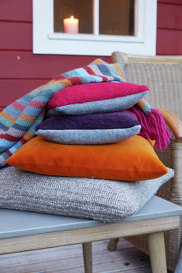 Cushions With Covers In Autumnal Colours And Knitted Blanket Photograph by Greenhaus Press
