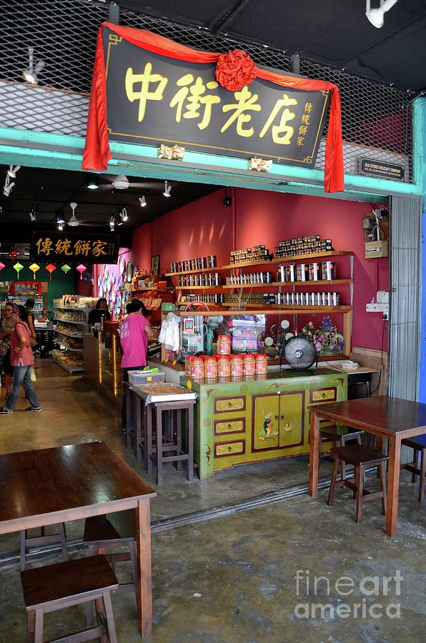 Customers browse Chinese food shop Jalan Padungan Kuching Sarawak Malaysia Photograph by Imran Ahmed