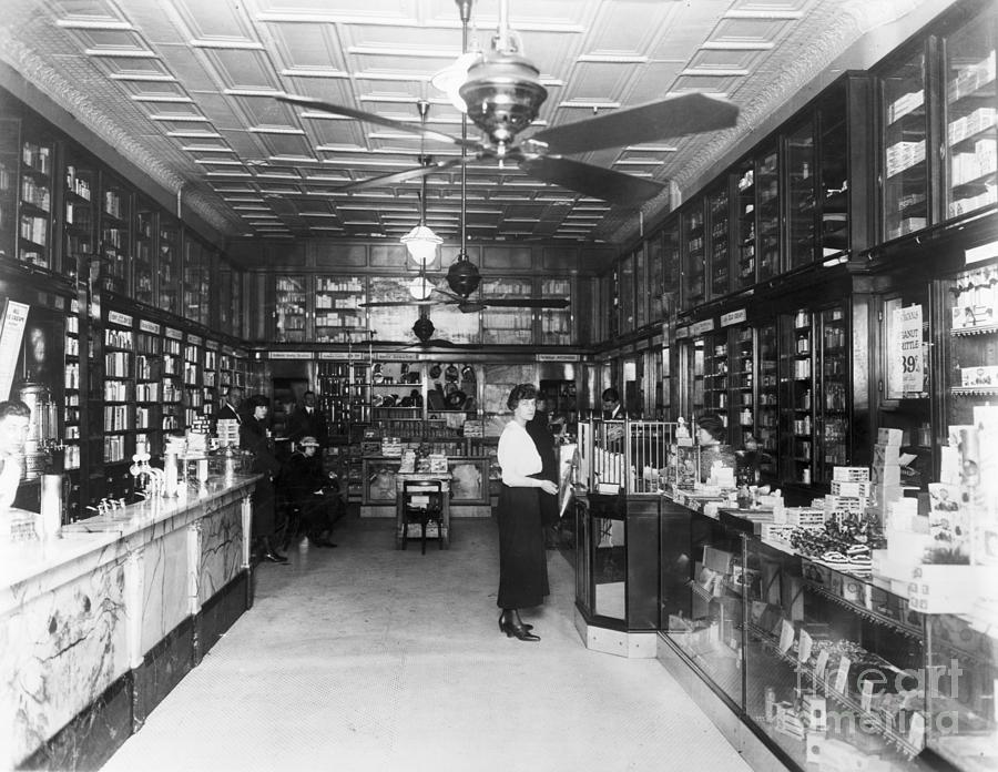 Customers Inside Drugstore Photograph by Bettmann