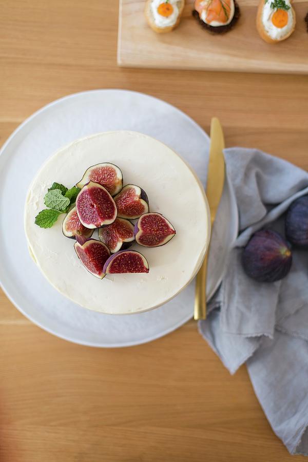 Cut Figs On Top Of White Cake Photograph by Wiener Wohnsinn