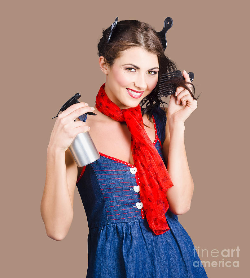 Cute girl model styling a hairdo. Pinup your hair Photograph by Jorgo Photography