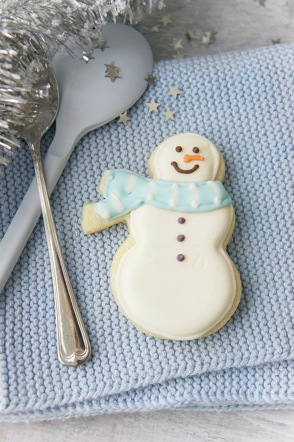 Cutlery With A Snowman Biscuit Photograph by Martina Schindler
