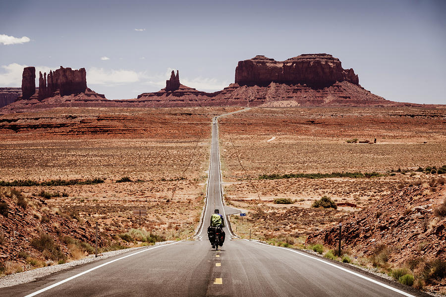 Cycling in the Monument Valley in Utah Photograph by Kamran Ali