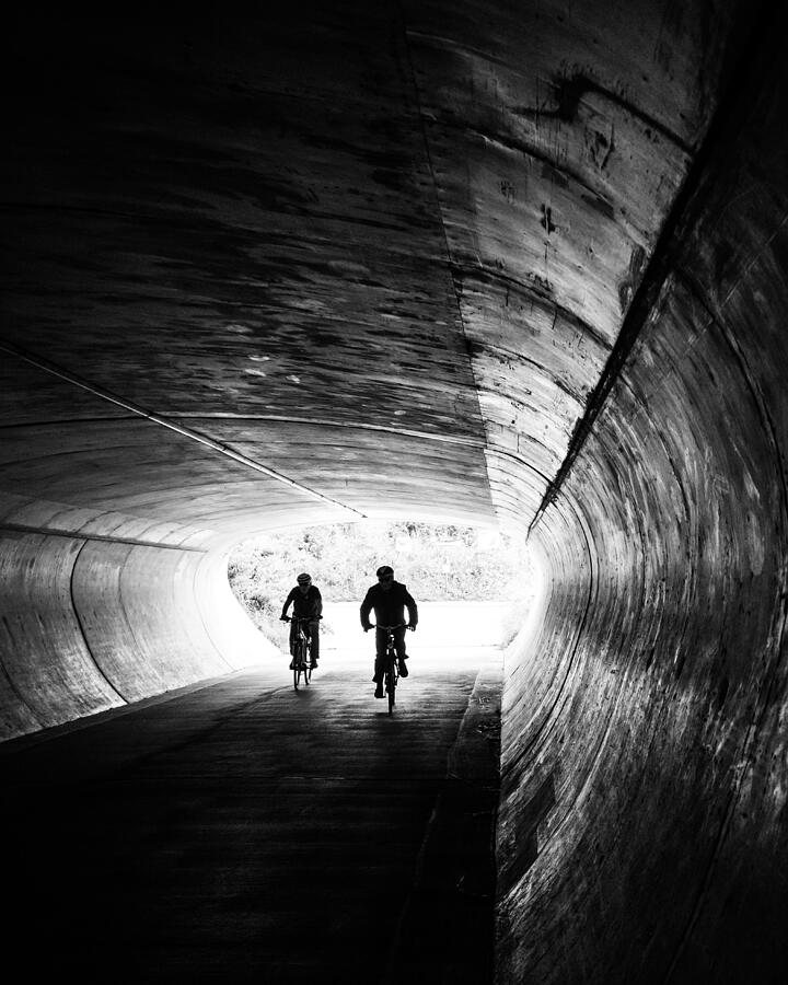 Cycling Into Darkness Photograph by Sofie Steenhoudt