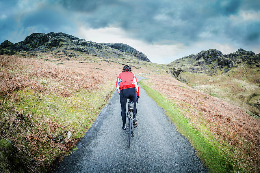 Cycling Up The Hardknott Pass Photograph by Steve Fleming